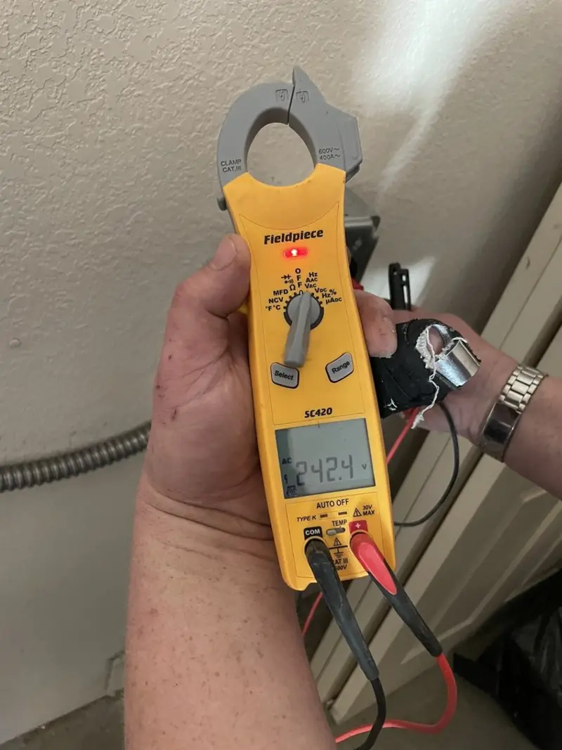 Voltage testing with clamp meter during Generator Installation in Bel Air South